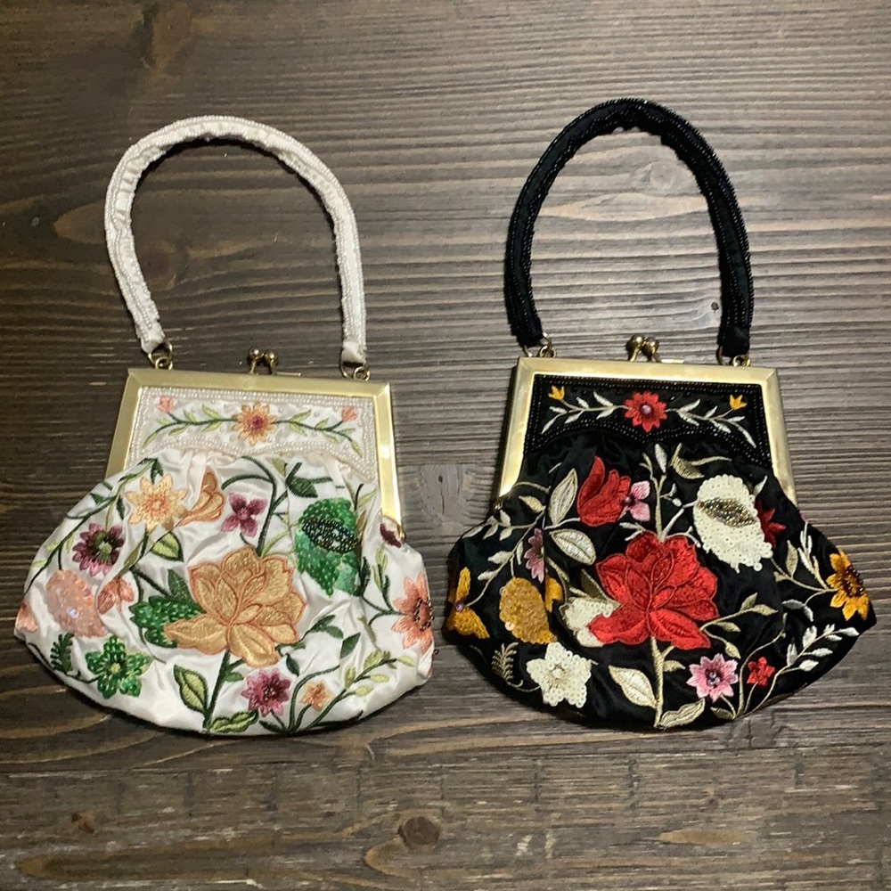 2 small clutches that include mirrors